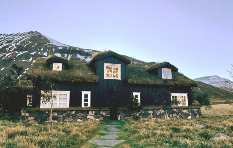 Moss covered house on display